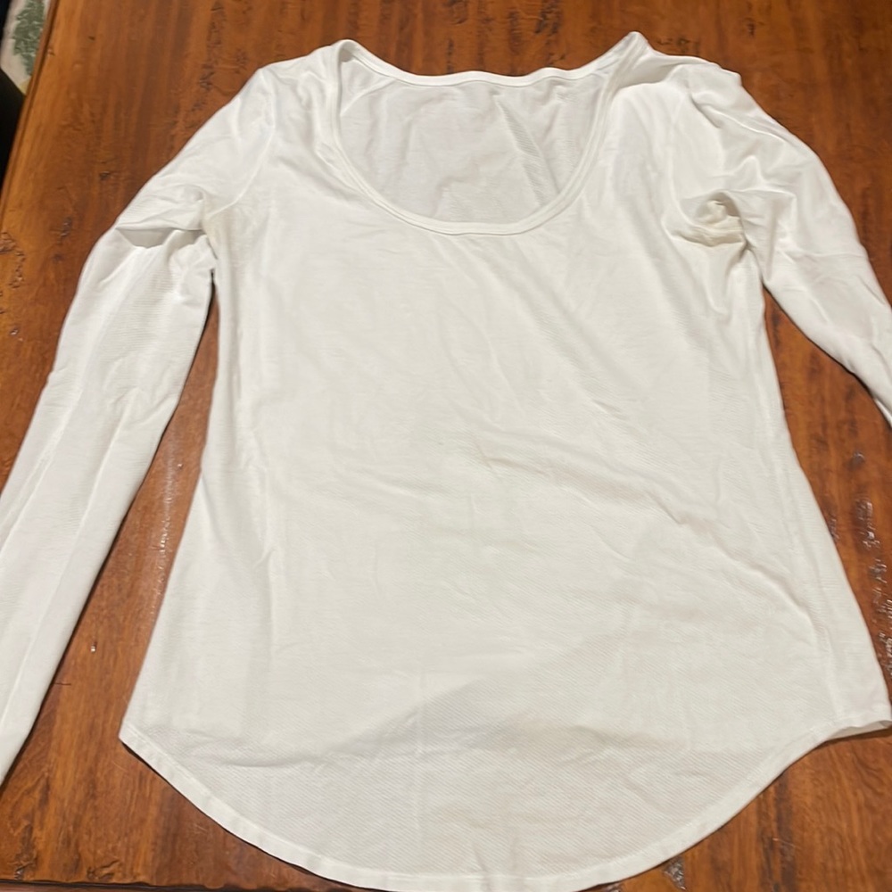Lululemon white scoop, neck compression airy shirt.